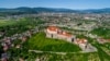 UKRAINE – Beautiful panoramic aerial view to Palanok Castle in the city of Mukachevo, Zakarpattia Oblast