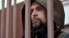 RUSSIA -- Aleksei Veresov, one of the defendants in a case over murder threats against a judge of the Moscow City Court, attends a court hearing in Moscow, November 13, 2019